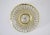Circular ceiling light in pressed glass dome, topped with a gilded throat, the base in brass doucine. Limburg publisher,...