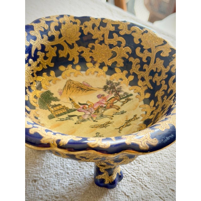 Antique Chinese export porcelain cobalt blue and gold gilt fox hunt bowl in the Qianlong style, late 19th to early 20th...