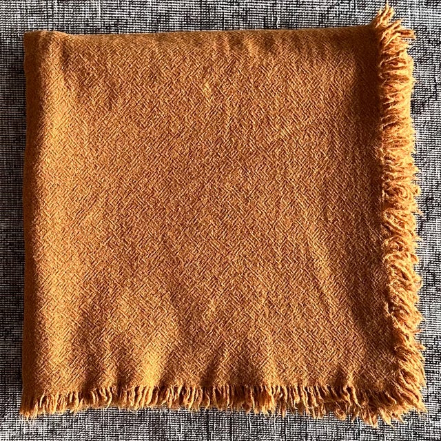 Cozy up with this soft throw imported from Pairs, France. Virgin wool is simply wool that’s never been used before. It’s...