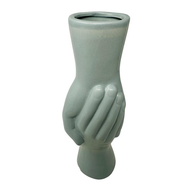 A striking, highly sculptural 1980s Postmodern ceramic column vase depicting two stylized, disembodied hands interlocking...