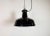 Industrial black enamel pendant light made by Elektrosvit in former Czechoslovakia during the 1950s. White enamel inside...