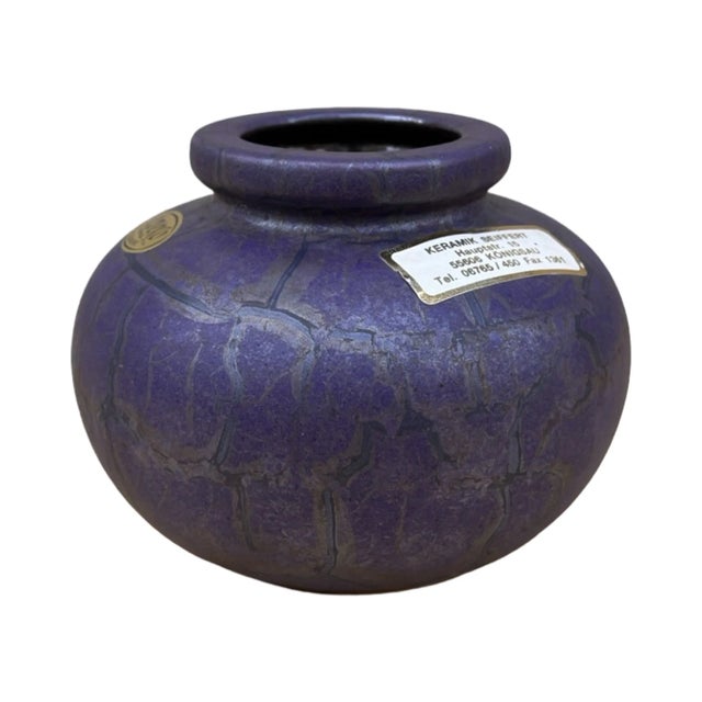 Ceramic vase in the Brussel style with mid-century modern elements produced in Germany in the 1970s for Jopeko Keramik....