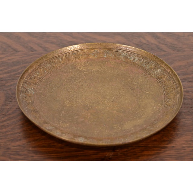 A gorgeous Arts & Crafts or Art Deco period bronze plate with Greek Key design By Tiffany Studios (signed to the...
