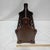 Stylish vintage Mid-Century Modern magazine rack crafted from warm walnut wood, showcasing the clean lines and timeless...