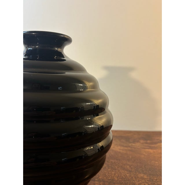 A striking Italian mid century Murano opaline glass vase, attributed to Napoleone Martinuzzi for Venini. Executed in deep...