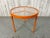 Round three legged side table newly powder coated in citrus orange. This table has the Peace symbol design where the three...
