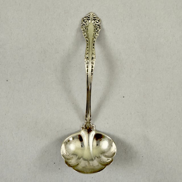 From the Alvin Sterling Silver Manufacturing Company, founded in Irvington, New Jersey in 1886, a small sauce or gravy...