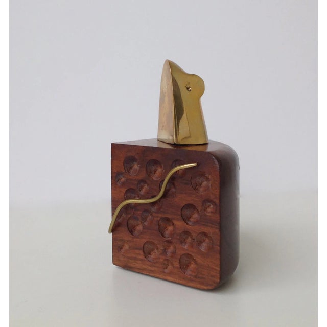 Vintage 1970s solid brass mouse mounted on a cheese shaped block of honed wood, with cheese holes, concave and indicative...