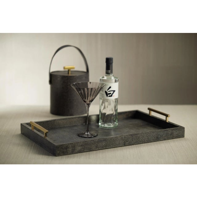 Made by glass artisans, this colored martini glass set features a streamlined design with a pop of color. Set a festive...