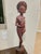 An extraordinary, beautifully paired matching set of two separate mid-century Balinese modernist sculptures presenting an...