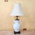 An exquisite Neoclassical porcelain urn lamp by Wildwood, handcrafted in Rocky Mount, North Carolina, showcasing refined...