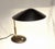 Vintage desk lamp Desk lamp made in Vienna around 1960. Black lacquered metal. Swivel shade. The lamp has been cleaned and...