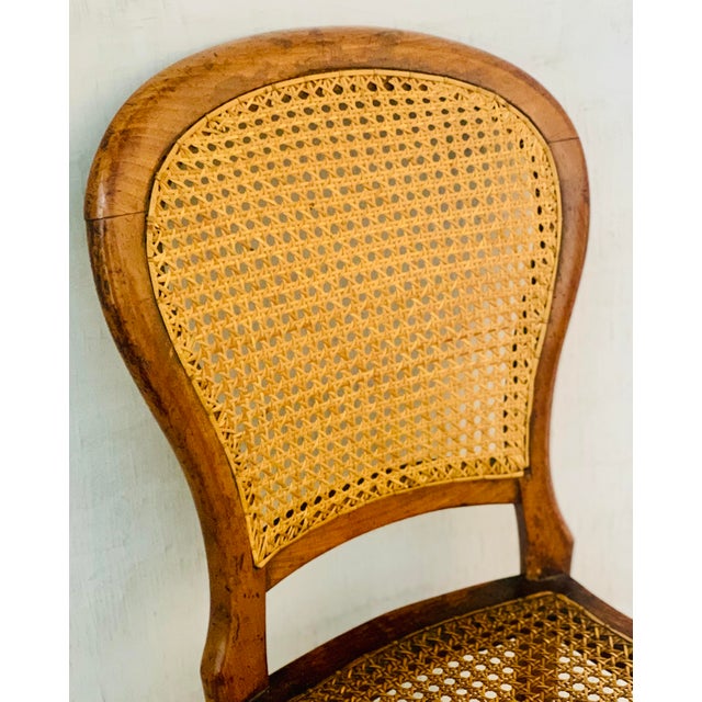 Early 20th Century Vintage Petite Boudoir Chair, Turned Fruitwood Legs and Stretcher With Balloon Caned Back and Seat, in the Style of Louis XVI For Sale - Image 4 of 12