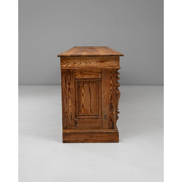 This exceptional 1900s French Belgian Provincial wooden shop counter by Emile Lambot of Châtelet showcases exquisite...