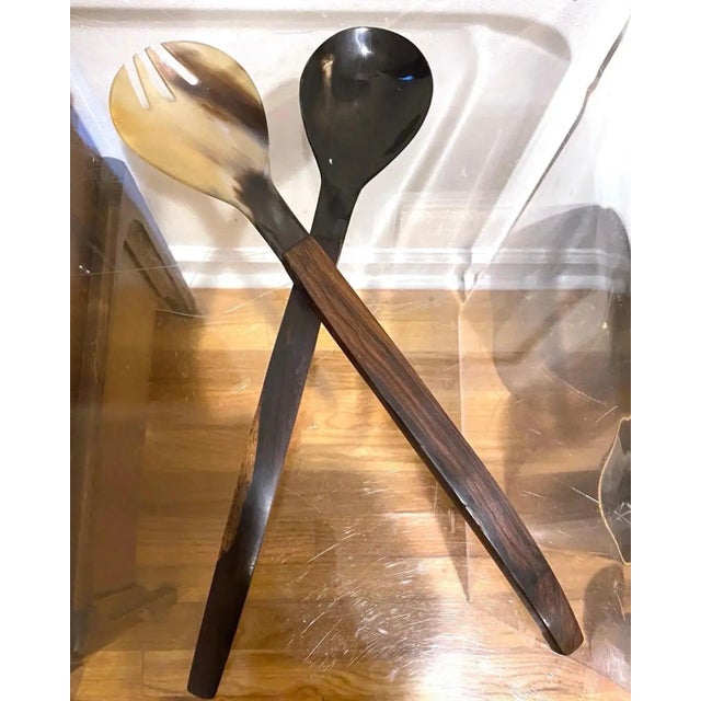 This stunning vintage Danish modern style serving set has gorgeous rosewood handles and equally as stunning Bakelite. I...