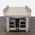 This Pottery Barn dining set features a sturdy rectangular wood table with a light, natural finish and industrial metal...