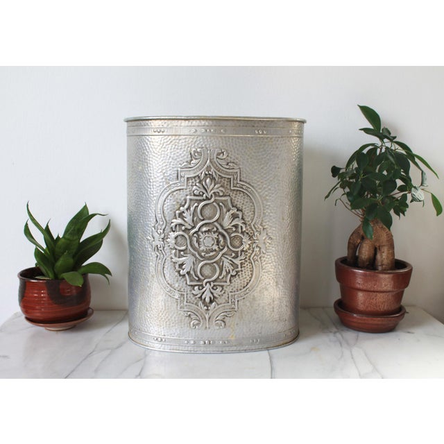 Vintage Reynolds Hammered Aluminum Waste Basket. Makers mark on bottom. Show signs of wear and use. Dents.