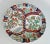 Hand painted porcelain Japanese Imari charger scallop edge plate with figures, buildings, trees, mountains, birds and...