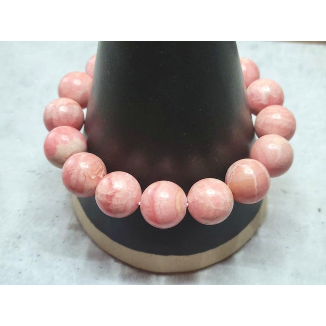 The length of the bracelet is 9 inches (23 cm). The rare size of the smooth round beads is 14 mm. Natural rose...