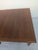 This Danish coffee table features a minimalist and timeless design that complements contemporary interiors. The table is...