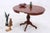 Vintage English-style table with a beautifully crafted central pedestal and curved base. The tabletop can be extended,...