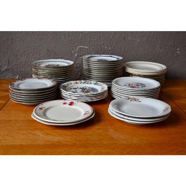 Imagine a long festive table set with this beautiful, eclectic collection of dessert plates, each telling its own little...