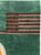 This striking Mid-20th century Chinese Art Deco rug, showcases a bold geometric composition set against a rich green...