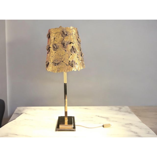 This lamp is a rare piece that is made of absolutely high quality solid brass. The lampshade consists of a canopy of...