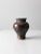 A vintage studio pottery vase dating to circa 1975, signed by the artist. The handcrafted ceramic form features a gray...