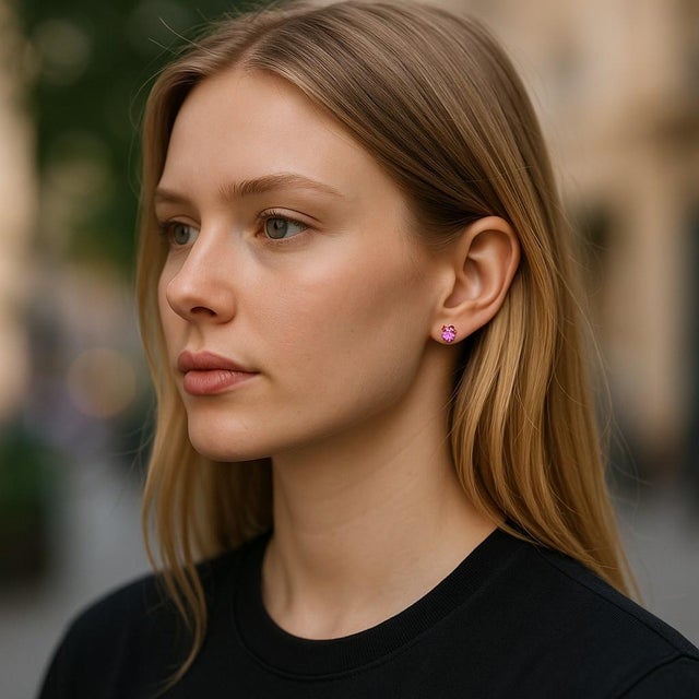 Introducing our exquisite two matched pair of Pink Sapphire 14 Karat Stud Earrings, a timeless and elegant addition to...