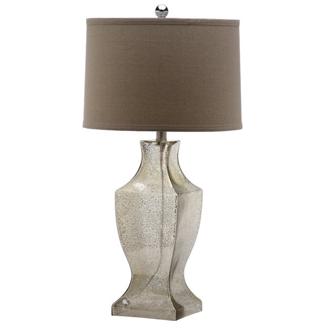 a ancient urn silhouette reappears in the fashion-forward Glass Bottom lamp by . Totally new-looking antique silver...