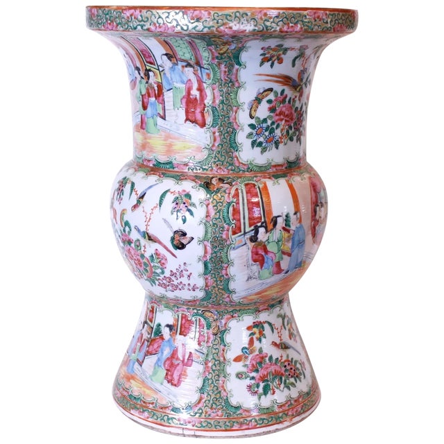A fine and large Chines export porcelain vase decorated with alternating figural court scenes and wild rose, bird and...
