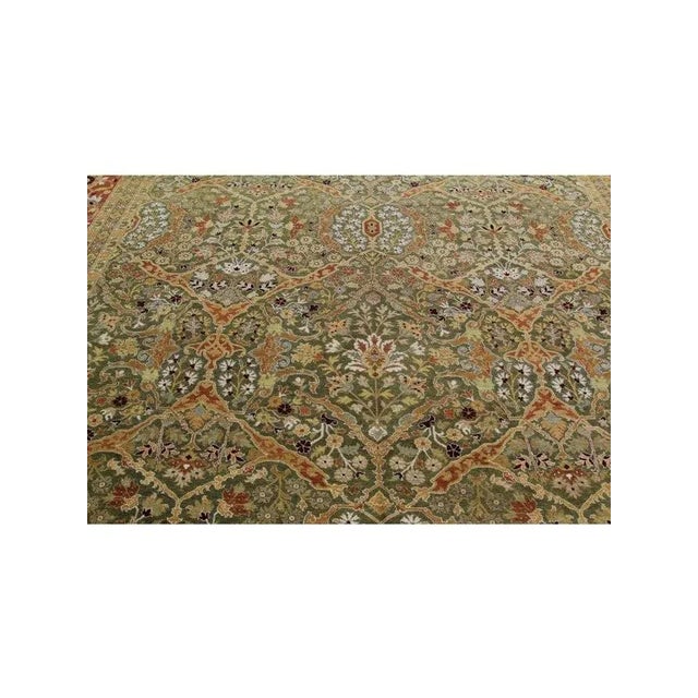 Transform your living space with the stunning charm of this 12x15 Tabriz style rug from Pakistan. Crafted with intricate...