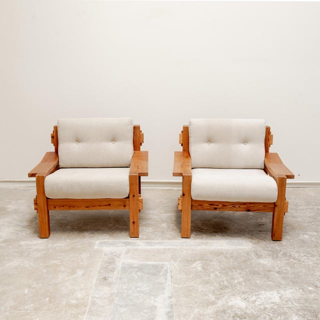 Pair of brutalist style armchairs in Baltic pine with expressed joining details, in the manner of Yngve Ekstrom, Denmark...