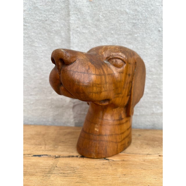 Vintage folk art carved wood dog head, c.1960’s Carved out of one piece of wood which shows wood grain with age and use...