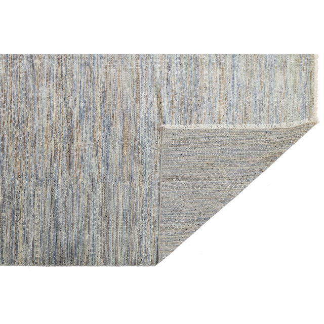 This antique Chinese Art Deco rug showcases a unique blend of Eastern craftsmanship and Western design. Featuring a rich...