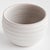 This handthrown pot has a weighty feel. Made with subtle ridges and a matte finish. The perfect little pot for your...