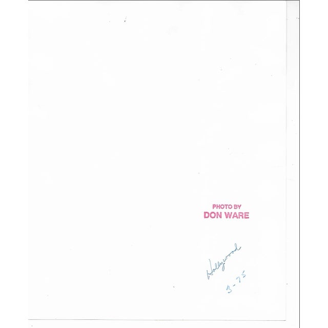 1975 black and white photograph by Los Angeles photographer Don Coleman Ware (1921-2006) of fire trucks along a stretch of...