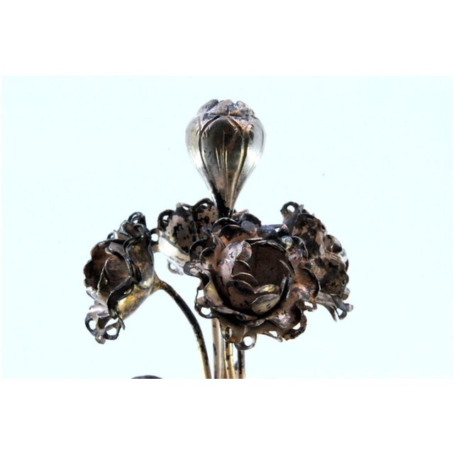Silver Toothpick Holder with Leaves and Flowers, in Very Good conditions. Designed before 1890 This piece has an...