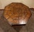 Handcrafted vintage game table featuring an extraordinary inlaid surface created from thousands of individually placed...