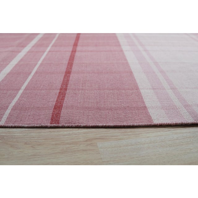 Maya Giselle Coral Flatweave Wool Rug, Country of Origin: India. This exceptional flatweave piece introduces a...