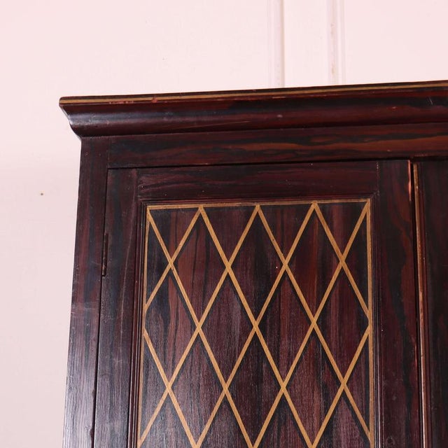 Interesting 19th C painted 4 door pine cupborad with faux brass grill decoration. 1880 Interior top 32.5cm Base 106cm This...