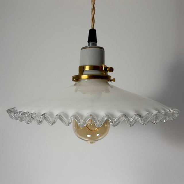 A beautifully hand-blown French white opaline glass pendant light dating to the 1930s. Sourced in Provence, this classic...