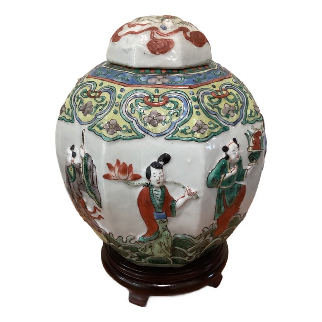 Antique Chinese Porcelain Ginger Jar With Molded Raised Eight Immortals on Wood Base For Sale
