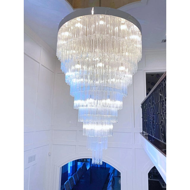 This is a custom made chandelier by LMD Custom Lighting Nickel polished finish and vintage Venini Tronchi glass tubes. It...