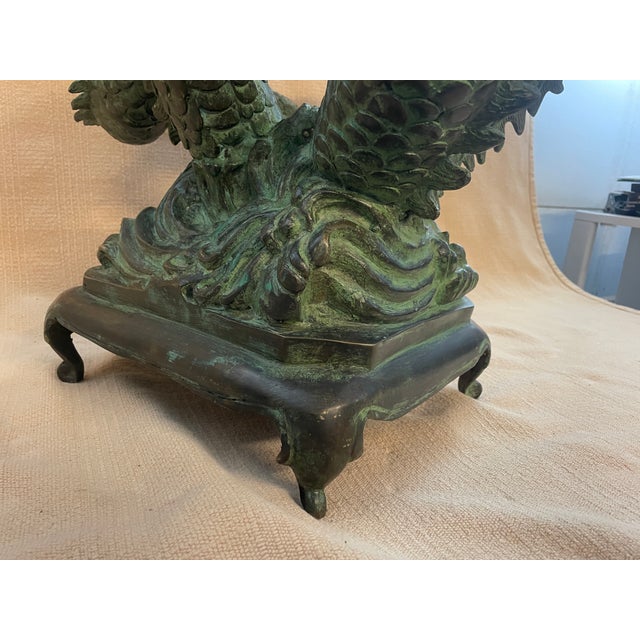 These are a beautiful pair of early 20th Century Asian cast bronze dragons. We have seen a similar single comp that was...