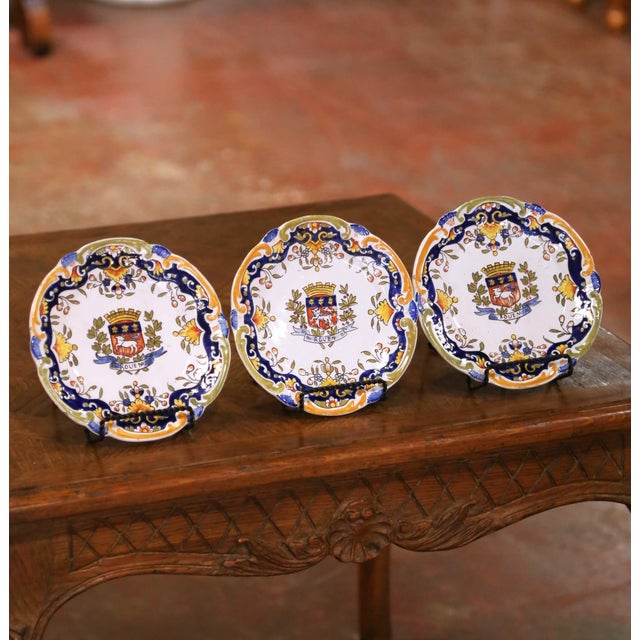 Decorate a kitchen wall with this charming set of three antique French faience plates. Crafted in Rouen circa 1920, each...