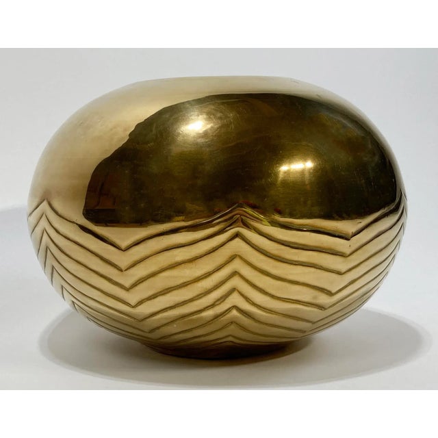 Vintage large round brass Postmodern style vase or planter featuring wavy chevron embossed pattern to bowl. Wonderful...