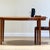 An exceptional Danish dining table designed by Johannes Andersen and handcrafted in Denmark during the 1960s by Skovmand &...