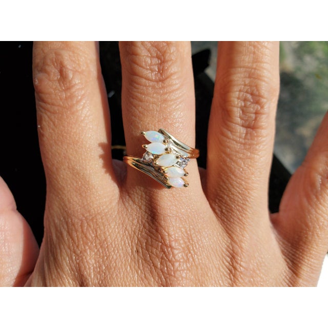 ♥ Product Summary ♥ Main Stone: Australian Opal Stone Shape: Marquise Band Material: 14k Yellow Gold Weight: 4 grams **Due...